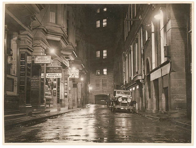 A wet Angel Place, Sydney, 1930s